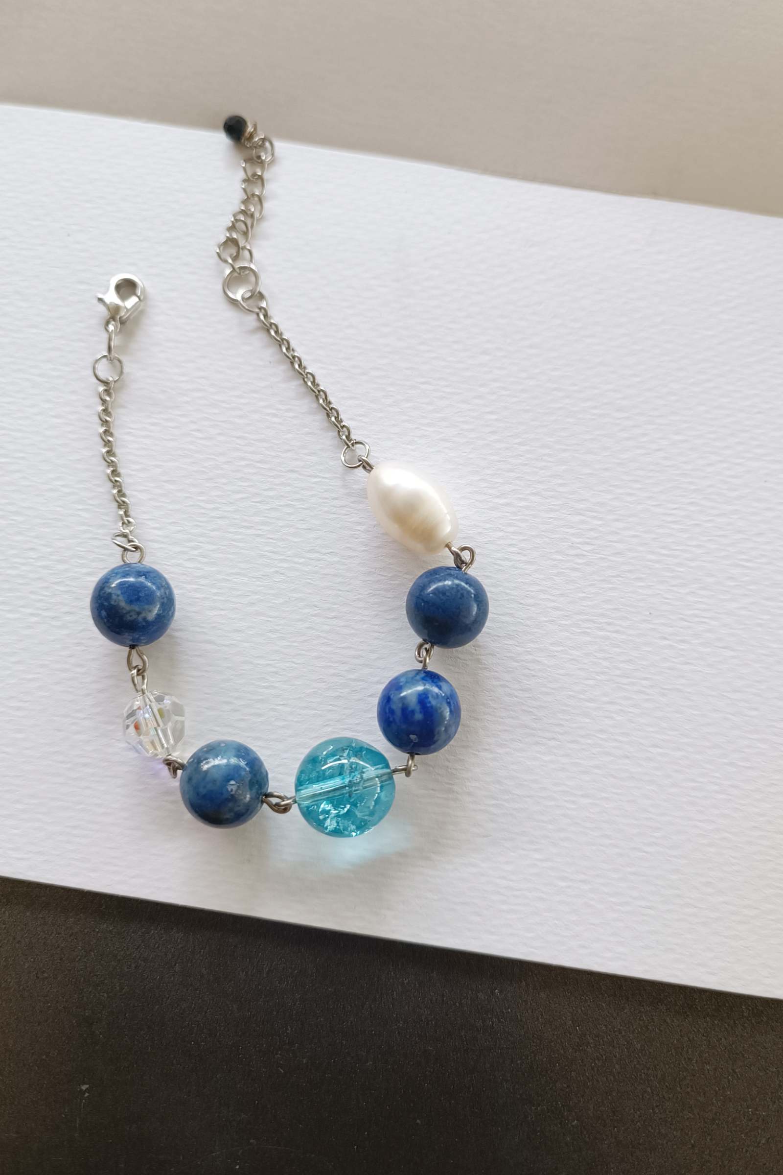 สร้อยข้อมือหินแท้ "Connected" Intuition and Communication Bracelet (Blue Topaz + Lapis Lazuli)