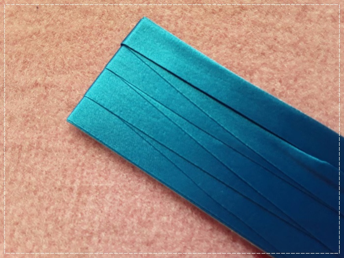 ผ้ากุ๊นซาติน สีฟ้าน้ำทะเล