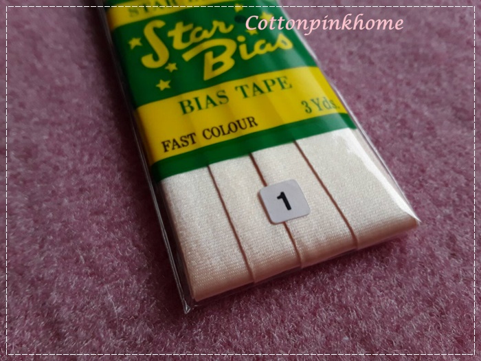 ผ้ากุ๊นซาติน สีครีม-ส้มอ่อน
