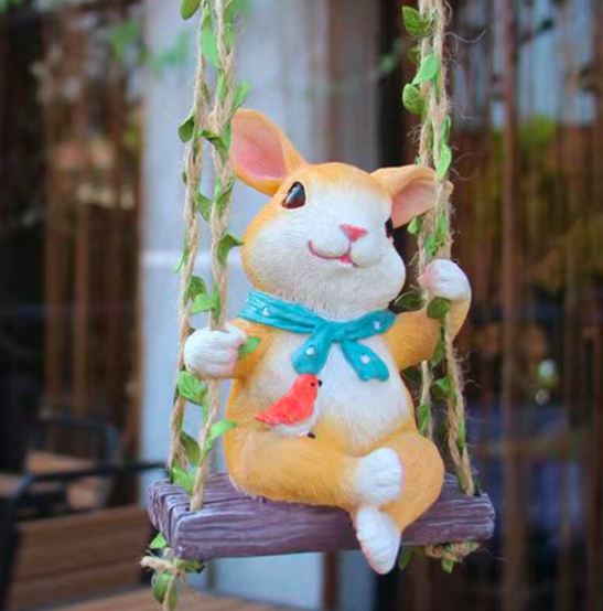 ตุ๊กตากระต่ายน้อยแต่งสวน นั่งชิงช้าเพลิดเพลิน