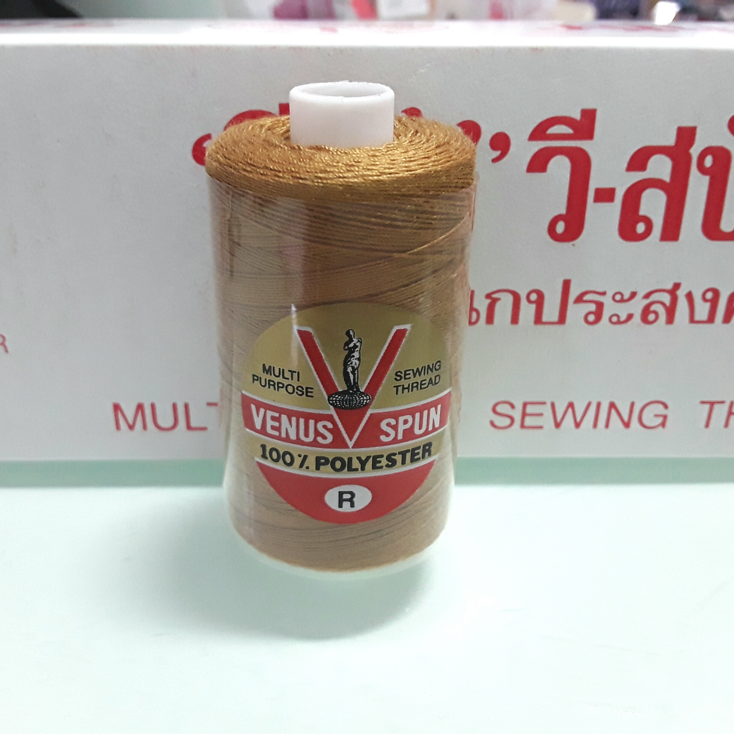 ด้ายเย็บผ้ายีนส์ สีน้ำตาลทอง