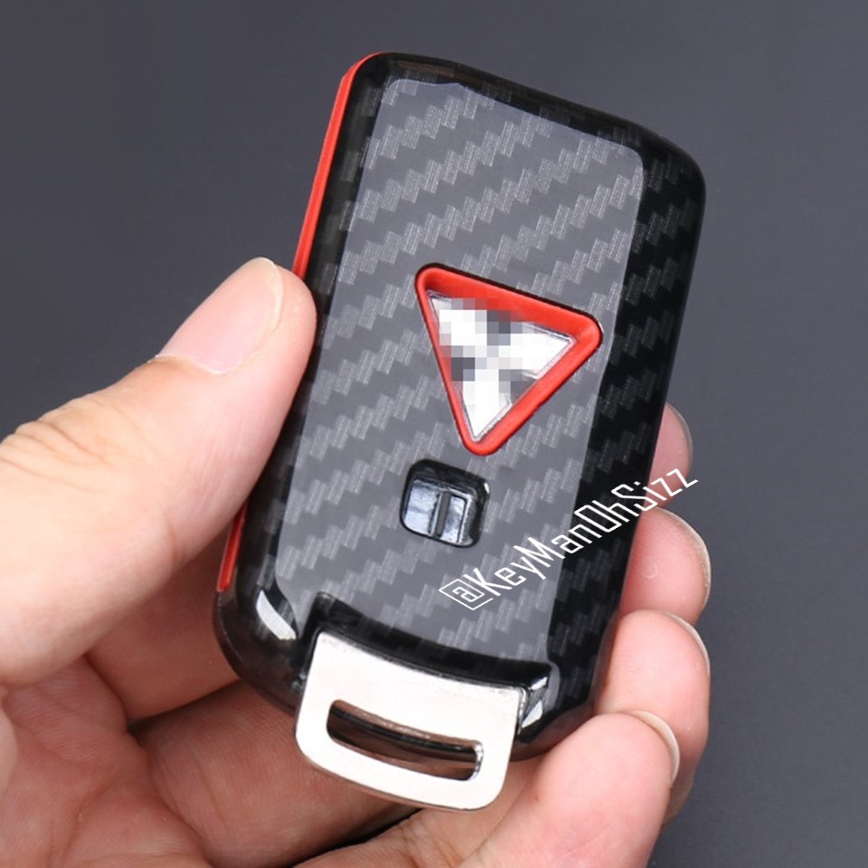 เคสรีโมทรถลายเคฟล่ารีโมทรถ Mitsubishi Pajero LED Key Chain สามารถถอดกุญแจรีโมทได้ Kevlar ABS / Silicone Push button Guard) Model Mitsubishi Pajero (Sport), Xpander, Mirage, Attrage, Triton Smart Key แบบ 2 และ 3 ปุ่ม