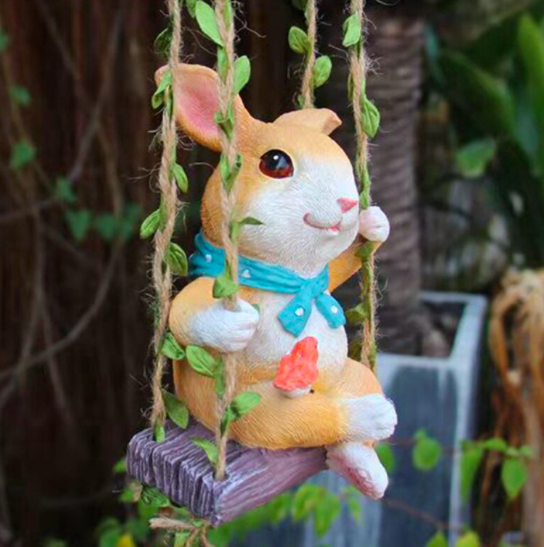 ตุ๊กตากระต่ายน้อยแต่งสวน นั่งชิงช้าเพลิดเพลิน