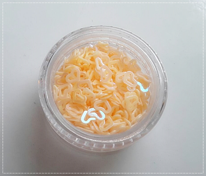 กากเพชรแฟนซีรูปหัวใจสีส้มอ่อน