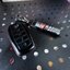 เคสหนังรีโมทรถ Toyota Fortuner Leader แบบ 4 ปุ่ม Fortuner GR Sport, Legender 2022 งานหนังด้ายแดง (Leather Key Case Key) พร้อมพวงกุญแจคล้องหูกางเกงหัวโลหะหมุนได้ 360 องศา